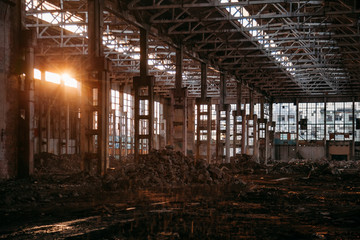  Sunlight of sunset in large abandoned industrial building of Voronezh excavator factory