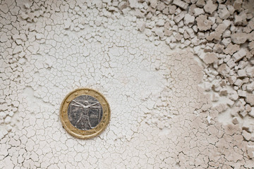 Euro coin on a decorative background