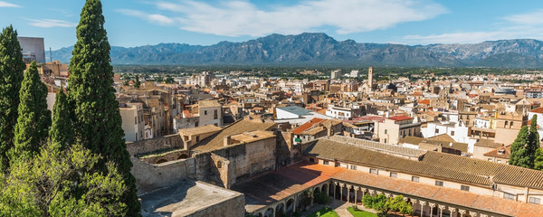 Wall Mural - Panorama top view of city buildings with the Templer Monastery of Santa Clara, Tortosa, Catalonia, Spain 