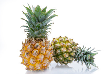 Two pineapples fruit isolate on white background.