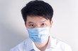 © Steve - A man wearing a disposable medical surgical mask