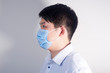 © Steve - A man wearing a disposable medical surgical mask