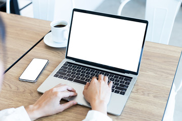 mockup image blank screen computer,cell phone with white background for advertising text,hand woman using laptop texting mobile contact business search information on desk in office.marketing,design