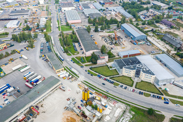 Wall Mural - top down view of city industrial zone with plants, factories and warehouses