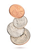 © Kuzmick - Flying coin stack with US cents isolated in white background