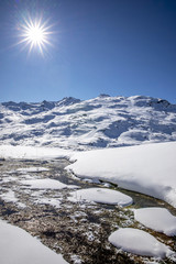 Wall Mural - Val Thorens, France - February 18, 2020: Landscape of Alps mountains in winter close to Lac du Lou, Val Thorens, France