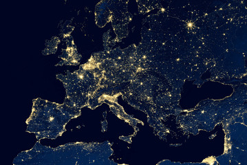 earth at night, city lights showing human activity in europe from space. elements of this image furn