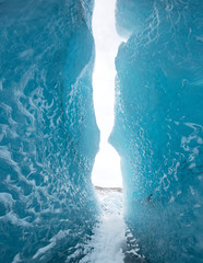 Entrance of an ice cave inside Vatnajokull glacier in southern Iceland. Amazing Iceland nature seascape popular tourist attraction. Best famouse travel locations. Scenic Image of southern Iceland