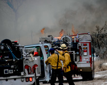 Firefighters At The Scene Of A Wildfire