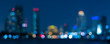 Banner cover of blurred bokeh cityscape at twilight time, city background, aerial view angle from rooftop ob building, defocused city in downtown,graphic design for web online or book horizontal cover