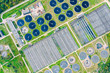 © Mr Twister - aerial top view of round water settlers for sewage recycling. modern wastewater treatment plant