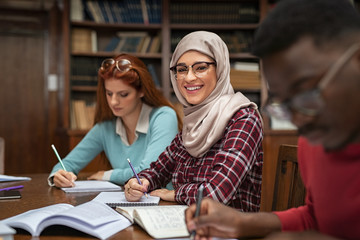 Islamic student at library