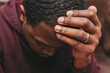 © rohane - black african american man depicting a sad depressive state, depression concept