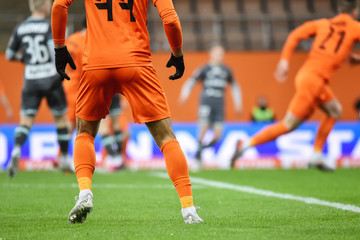 Detail of player's legs during football match