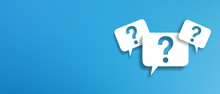Question Marks With Speech Bubbles On Blue Background	