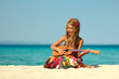 © Kostia - little girl on the beach with ukulele