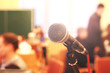 © Stasiuk - Close up microphone on the background of the hall