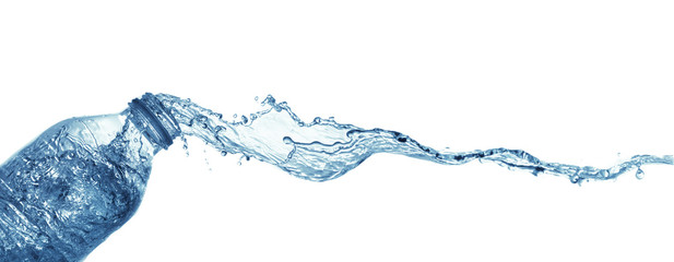 isolated of water splashing form the bottle on white background.