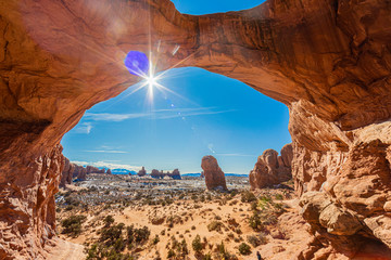 Wall Mural - Backlight picture from Double Arch in the Arches National Park in winter