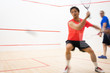 © lightpoet - Squash players in action on a squash court (motion blurred image; color toned image)