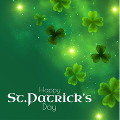 St Patricks Day background with shamrock, lucky clover leaves, lights and blurred fog.