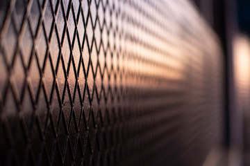 patterned texture sunset on iron surface