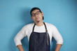 © airdone - Portrait of male Asian chef or waiter thinking something, worried confused expression