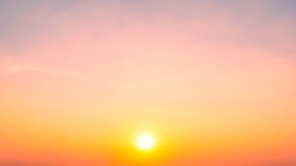 Wall Mural - Sky blue and orange light of the sun through the clouds in the sky