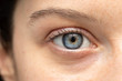 © Alessandro Grandini - Macro shot of a young girl's beautiful blue eye. Vision eyesight eye care concept