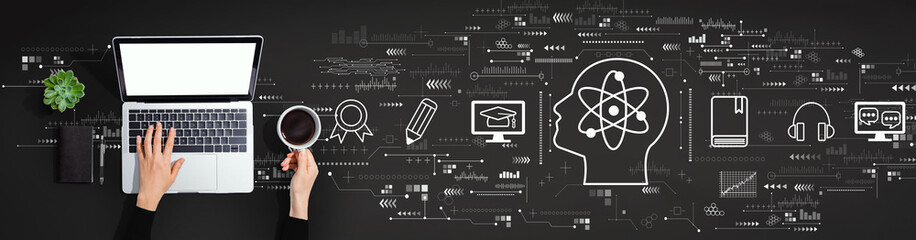 Online education concept with person using a laptop computer
