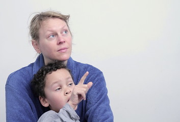 Wall Mural - mother and child looking up with white background stock photo 