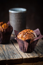 Homemade Fresh Baked Carrot Muffins With Hazelnut And Orange On Wooden Background