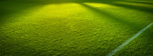 Side Lines Panorama Of An Empty Green Sports Field Before A Game