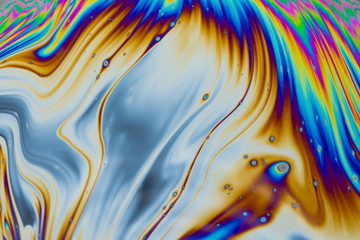 Wall Mural - psychedelic multicolored patterns background. photo macro shot of soap bubbles