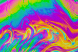 Fototapeta Tęcza - Psychedelic multicolored patterns background. Photo macro shot of soap bubbles