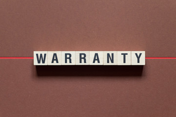 Wall Mural - Warranty word concept on cubes