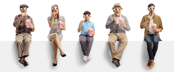 Sticker - Young and elderly people sitting on a panel eating popcorn and watching a 3d movie