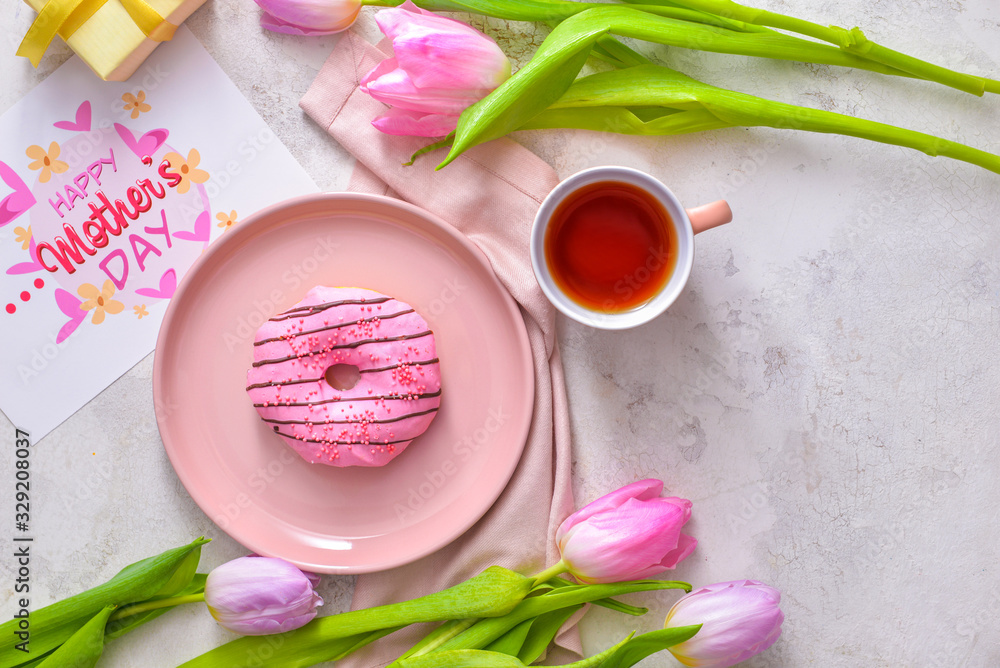 Tasty breakfast for mother on white background