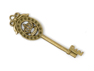 Wall Mural - old brass key against a white background