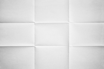 Wall Mural - White paper folded in nine fraction background