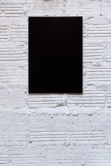 Black frame on white color cement background.