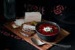 Traditional ukrainian cuisine. Bowl with tasty red borscht soup.