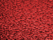 Red Stained Glass Window Texture. Closeup Of Frosted Glass Texture.Gradient Background Sheet Of Glass Backdrop. Glossy Pattern With Corner Spotlight Sunshine And Blotchy Mosaic Effect Metallic Shine