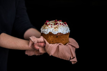 Easter composition with sweet bread, kulich and eggs on light background.