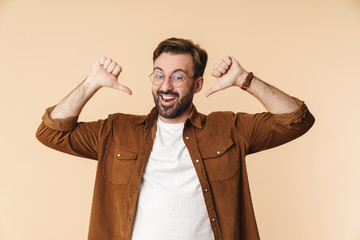 Sticker - Portrait of a cheerful young arttractive bearded man