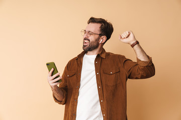 Sticker - Portrait of a cheerful young arttractive bearded man