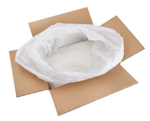 Open carton box  with white powder wrapped in plastic. Packaging.