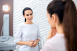 © zinkevych - Attentive plastic surgeon listening to her patient telling about problems