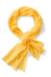 Subject shot of a yellow scarf made of semi-transparent viscose fabric. The tied scarf is isolated on the white background.  