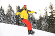© New Africa - Male snowboarder on snowy hill. Winter vacation